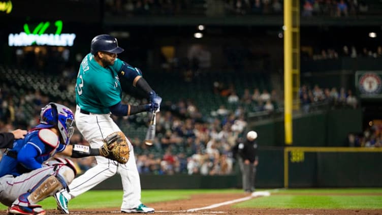 SEATTLE, WA - SEPTEMBER 28: Nelson Cruz #23 of the Seattle Mariners hits a double to score Robinson Cano #22 against the Texas Rangers at Safeco Field on September 28, 2018 in Seattle, Washington. (Photo by Lindsey Wasson/Getty Images)