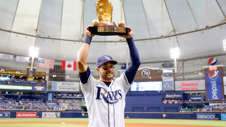 Apr 8, 2017; St. Petersburg, FL, USA; Tampa Bay Rays center fielder Kevin Kiermaier (39) is presented the Gold Glove Award prior to the game against the Toronto Blue Jays at Tropicana Field. Mandatory Credit: Kim Klement-USA TODAY Sports