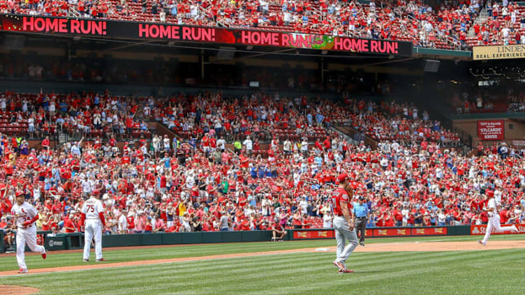 ST. LOUIS, MO - JUNE 6: Paul DeJong #12 of the St. Louis Cardinals rounds the bases at third on his two-run home run off of pitcher Michael Lorenzen #21 of the Cincinnati Reds in the seventh inning at Busch Stadium on June 6, 2019 in St. Louis, Missouri. (Photo by Scott Kane/Getty Images)