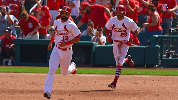 ST. LOUIS, MO - SEPTEMBER 14: Matt Carpenter #13 and Tommy Pham #28 of the St. Louis Cardinals rounds the bases after Pham hit a two-run home run against the Cincinnati Reds in the fifth inning at Busch Stadium on September 14, 2017 in St. Louis, Missouri. (Photo by Dilip Vishwanat/Getty Images)