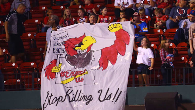 ST. LOUIS, MO - SEPTEMBER 29: Protesters unfurl a banner during a game between the St. Louis Cardinals and the Milwaukee Brewers at Busch Stadium on September 29, 2017 in St. Louis, Missouri. (Photo by Dilip Vishwanat/Getty Images)