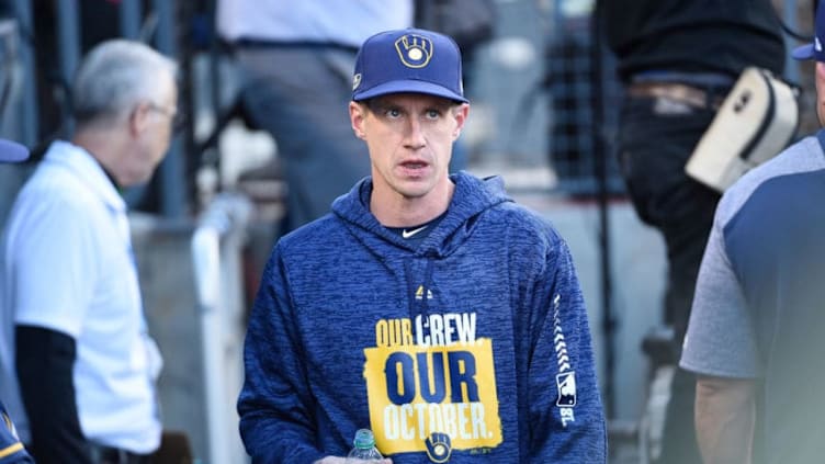 LOS ANGELES, CA - OCTOBER 15: Manager Craig Counsell #30 of the Milwaukee Brewers looks on from the dugout during the first inning of Game Three of the National League Championship Series against the Los Angeles Dodgers at Dodger Stadium on October 15, 2018 in Los Angeles, California. (Photo by Kevork Djansezian/Getty Images)