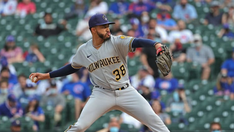 CHICAGO, ILLINOIS - APRIL 07: Devin Williams #38 of the Milwaukee Brewers pitches against the Chicago Cubs at Wrigley Field on April 07, 2021 in Chicago, Illinois. The Brewers defeated the Cubs 4-2 in 10 innings. (Photo by Jonathan Daniel/Getty Images)