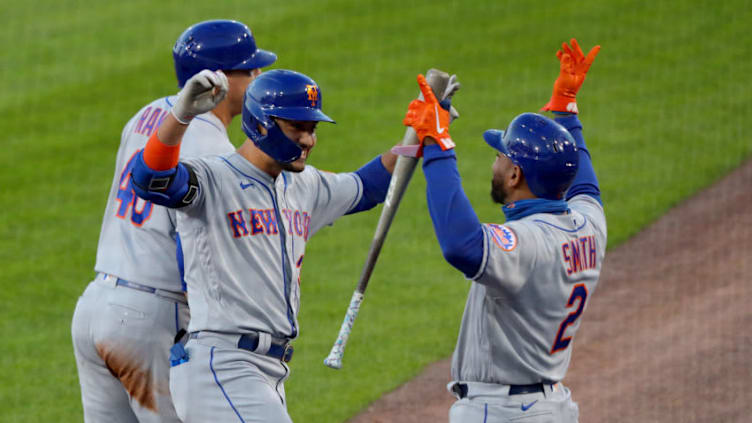 BUFFALO, NY - SEPTEMBER 11: Michael Conforto #30 of the New York Mets celebrates his home run with Dominic Smith #2 during the third inning against the Toronto Blue Jays at Sahlen Field on September 11, 2020 in Buffalo, United States. (Photo by Timothy T Ludwig/Getty Images)