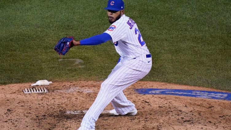 CHICAGO, ILLINOIS - SEPTEMBER 16: Jeremy Jeffress #24 of the Chicago Cubs throws a pitch during the ninth inning of a game against the Cleveland Indians at Wrigley Field on September 16, 2020 in Chicago, Illinois. (Photo by Nuccio DiNuzzo/Getty Images)