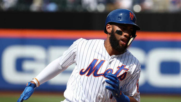 NEW YORK, NY - MAY 20: Amed Rosario #1 of the New York Mets rounds the bases after hitting a home run against Jorge De La Rosa #29 of the Arizona Diamondbacks in the seventh inning during their game at Citi Field on May 20, 2018 in New York City. (Photo by Al Bello/Getty Images)