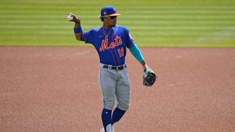 Mar 8, 2021; West Palm Beach, Florida, USA; New York Mets shortstop Francisco Lindor (12) warms up prior to the spring training game against the Washington Nationals at The Ballpark of the Palm Beaches. Mandatory Credit: Jasen Vinlove-USA TODAY Sports