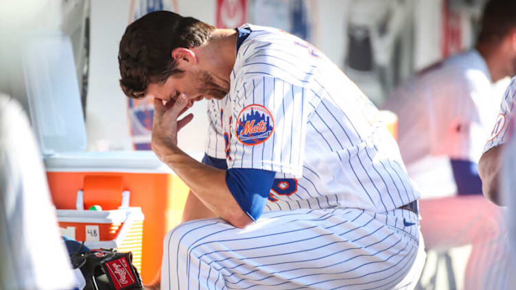 Jun 26, 2021; New York City, New York, USA; New York Mets pitcher Jacob deGrom (48) back in the dugout after giving up a run in the sixth inning against the Philadelphia Phillies at Citi Field. Mandatory Credit: Wendell Cruz-USA TODAY Sports