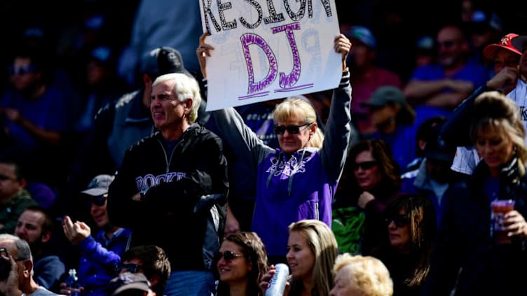 DENVER, CO - SEPTEMBER 30: Fans hold a sign in support of DJ LeMahieu #9 of the Colorado Rockies before a game between the Colorado Rockies and the Washington Nationals at Coors Field on September 30, 2018 in Denver, Colorado. (Photo by Dustin Bradford/Getty Images)