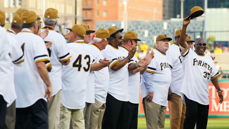 PITTSBURGH - JUNE 21: Manny Sanguillen #35 of the World Series Champion 1971 Pittsburgh Pirates salutes the crowd after being introduced before the game against the Baltimore Orioles on June 21, 2011 at PNC Park in Pittsburgh, Pennsylvania. (Photo by Jared Wickerham/Getty Images)