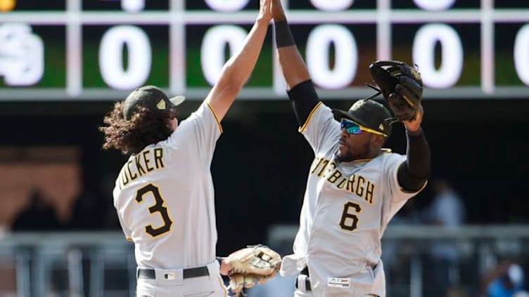 SAN DIEGO, CA - MAY 19: Cole Tucker #3 and Starling Marte #6 of the Pittsburgh Pirates celebrate after defeating the San Diego Padres 6-4 at Petco Park May 19, 2019 in San Diego, California. (Photo by Denis Poroy/Getty Images)