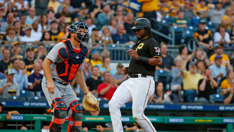 PITTSBURGH, PA - JUNE 19: Josh Bell #55 of the Pittsburgh Pirates scores on an RBI single in the second inning against the Detroit Tigers during inter-league play at PNC Park on June 19, 2019 in Pittsburgh, Pennsylvania. (Photo by Justin K. Aller/Getty Images)