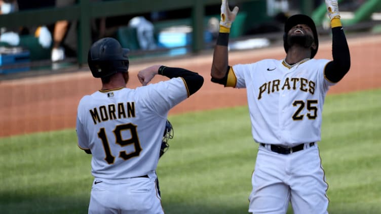 PITTSBURGH, PA - AUGUST 22: Gregory Polanco #25 of the Pittsburgh Pirates celebrates with Colin Moran #19 after hitting a two run home run in the fourth inning during the game against the Milwaukee Brewers at PNC Park on August 22, 2020 in Pittsburgh, Pennsylvania. (Photo by Justin Berl/Getty Images)