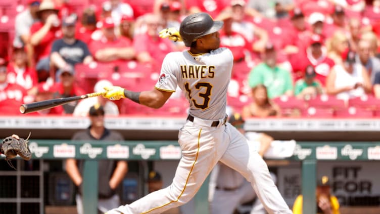 CINCINNATI, OH - AUGUST 08: Ke'Bryan Hayes #13 of the Pittsburgh Pirates hits a solo home run in the sixth inning of the game against the Cincinnati Reds at Great American Ball Park on August 8, 2021 in Cincinnati, Ohio. Cincinnati defeated Pittsburgh 3-2. (Photo by Kirk Irwin/Getty Images)