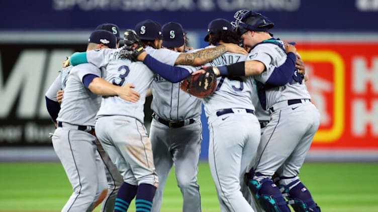 TORONTO, ON - OCTOBER 07: The Seattle Mariners celebrate the win following Game One of the AL Wild Card series against the Toronto Blue Jays at Rogers Centre on October 7, 2022 in Toronto, Ontario, Canada. (Photo by Vaughn Ridley/Getty Images)