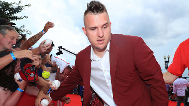 WASHINGTON, DC - JULY 17: Mike Trout #27 of the Los Angeles Angels of Anaheim and the American League signs autographs for fans at the 89th MLB All-Star Game, presented by MasterCard red carpet at Nationals Park on July 17, 2018 in Washington, DC. (Photo by Mike Lawrie/Getty Images)