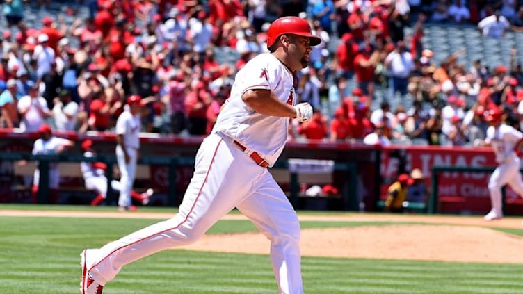 Jul 17, 2016; Anaheim, CA, USA; Los Angeles Angels designated hitter Albert Pujols (5) rounds first base after hitting a two run home run in the fourth inning of the game against the Chicago White Sox at Angel Stadium of Anaheim. Mandatory Credit: Jayne Kamin-Oncea-USA TODAY Sports