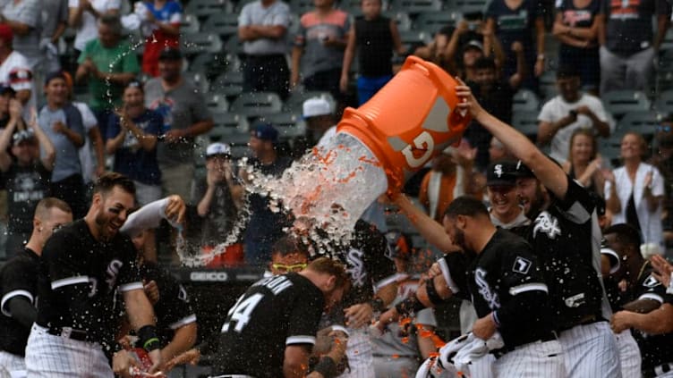 CHICAGO, IL - SEPTEMBER 03: Matt Davidson #24 of the Chicago White Soxis greeted by his teammates after hitting a two-run walk-off home run against the Detroit Tigers during the ninth inning on September 3, 2018 at Guaranteed Rate Field in Chicago, Illinois. The White Sox won 4-2. (Photo by David Banks/Getty Images)