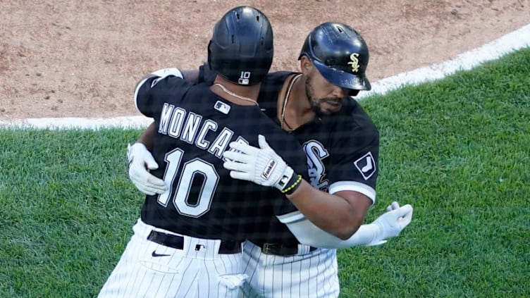 CHICAGO, ILLINOIS - MAY 29: Jose Abreu #79 of the Chicago White Sox is greeted by Yoan Moncada #10 after hitting a two-run home run against the Baltimore Orioles during the sixth inning Game Two of a doubleheader at Guaranteed Rate Field on May 29, 2021 in Chicago, Illinois. (Photo by David Banks/Getty Images)