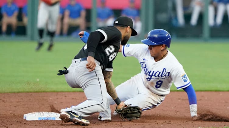 KANSAS CITY, MISSOURI - MAY 18: Nicky Lopez #8 of the Kansas City Royals steals second base ahead of the tag by Leury Garcia #28 of the Chicago White Sox in the second inning at Kauffman Stadium on May 18, 2022 in Kansas City, Missouri. (Photo by Ed Zurga/Getty Images)