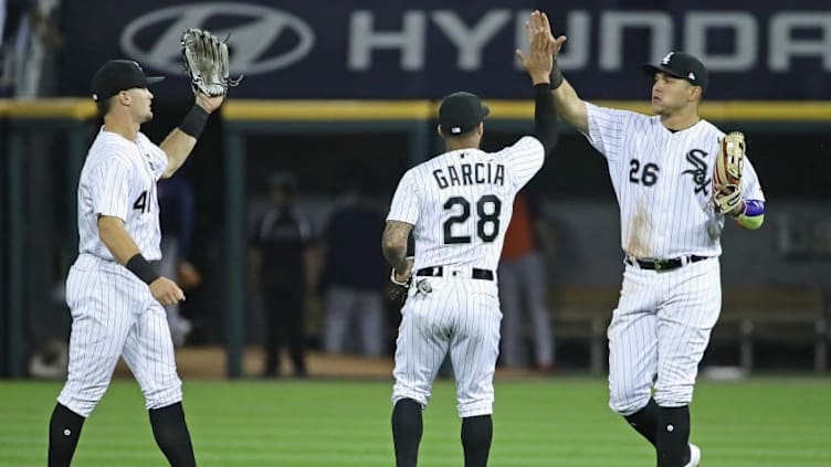 CHICAGO, IL - AUGUST 09: (L-R) Adam Engel #41, Leury Garcia #28 and Avisail Garcia #26 of the Chicago White Sox celebrate a win over the Houston Astros at Guaranteed Rate Field on August 9, 2017 in Chicago, Illinois. The White Sox defeated the Astros 7-1. (Photo by Jonathan Daniel/Getty Images)