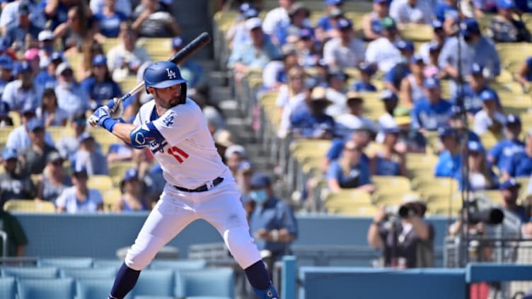 LOS ANGELES, CALIFORNIA - OCTOBER 03: AJ Pollock #11 of the Los Angeles Dodgers bats against the Milwaukee Brewers at Dodger Stadium on October 03, 2021 in Los Angeles, California. (Photo by Jonathan Moore/Getty Images)