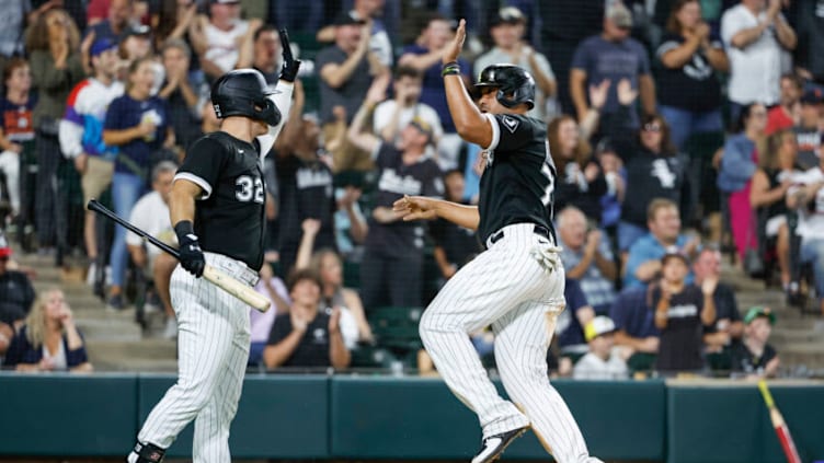 Aug 13, 2022; Chicago, Illinois, USA; Chicago White Sox first baseman Jose Abreu (79) celebrates with right fielder Gavin Sheets (32) after scoring against the Detroit Tigers during the seventh inning at Guaranteed Rate Field. Mandatory Credit: Kamil Krzaczynski-USA TODAY Sports