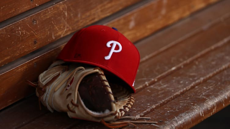 Glove and Philadelphia Phillies hat (Photo by Victor Decolongon/Getty Images)