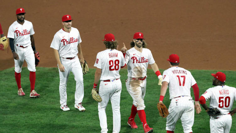 Bryce Harper #3 and Alec Bohm #28 of the Philadelphia Phillies (Photo by Hunter Martin/Getty Images)