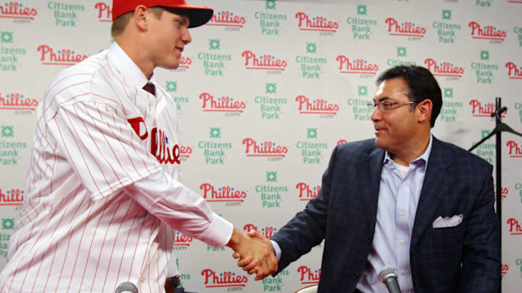 Former General Manager Ruben Amaro Jr. and Jonathan Papelbon of the Philadelphia Phillies (Photo by Len Redkoles/Getty Images)