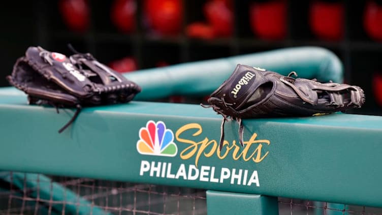 PHILADELPHIA, PA - APRIL 11: Baseball gloves waiting for action above the NBC Sports Philadelphia logo before the MLB game between the Cincinnati Reds and the Philadelphia Phillies on April 11, 2018 at Citizens Bank Park in Philadelphia PA. (Photo by Gavin Baker/Icon Sportswire via Getty Images)