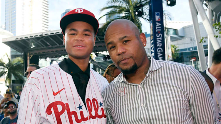 LOS ANGELES, CA - JULY 17: Justin Crawford poses with his Carl Crawford after he was picked 17th by the Philadelphia Phillies during the 2022 MLB Draft at XBOX Plaza on July 17, 2022 in Los Angeles, California. (Photo by Kevork Djansezian/Getty Images)