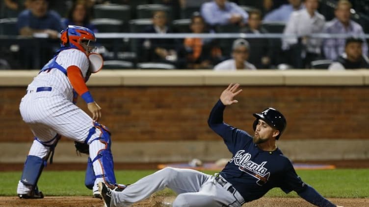 Sep 21, 2016; New York City, NY, USA; Atlanta Braves center fielder Ender Inciarte (11) scores the tying run in the eighth inning against the New York Mets at Citi Field. Mandatory Credit: Noah K. Murray-USA TODAY Sports