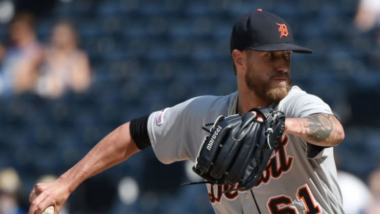 KANSAS CITY, MISSOURI - JULY 14: Relief pitcher Shane Greene #61 of the Detroit Tigers throws in the ninth inning against the Kansas City Royals at Kauffman Stadium on July 14, 2019 in Kansas City, Missouri. (Photo by Ed Zurga/Getty Images)