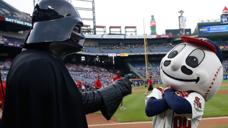ATLANTA, GA - JULY 03: Darth Vader pretends to put a choking spell on Homer the Brave during Star Wars Night festivities before the game between the Philadelphia Phillies and the Atlanta Braves at Turner Field on July 3, 2015 in Atlanta, Georgia. (Photo by Mike Zarrilli/Getty Images)