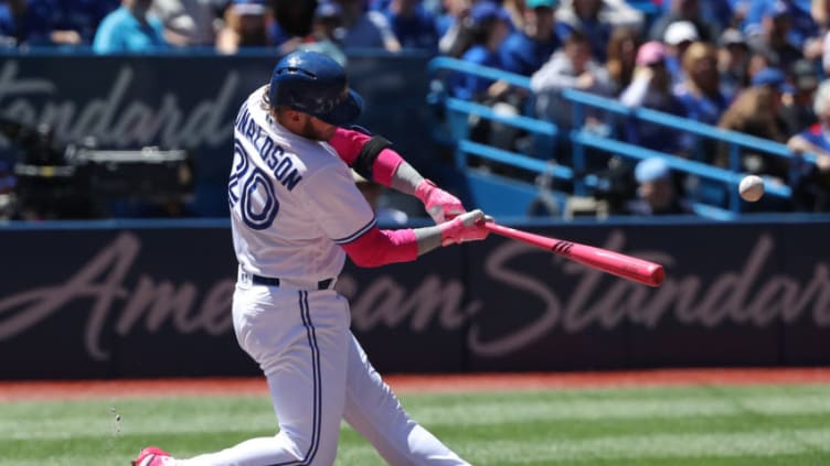 TORONTO, ON - MAY 13: Josh Donaldson #20 of the Toronto Blue Jays hits a double in the first inning during MLB game action against the Boston Red Sox at Rogers Centre on May 13, 2018 in Toronto, Canada. (Photo by Tom Szczerbowski/Getty Images)