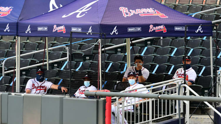 ATLANTA, GEORGIA - AUGUST 01: The Atlanta Braves bullpen looks on from the stands during the game against the New York Mets at Truist Park on August 01, 2020 in Atlanta, Georgia. (Photo by Scott Cunningham/Getty Images)