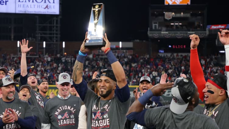 ATLANTA, GEORGIA - OCTOBER 23: Eddie Rosario #8 of the Atlanta Braves is named the Most Valuable Player of the National League Championship Series after defeating the Los Angeles Dodgers at Truist Park on October 23, 2021 in Atlanta, Georgia. The Braves defeated the Dodgers 4-2 to advance to the 2021 World Series. (Photo by Kevin C. Cox/Getty Images)