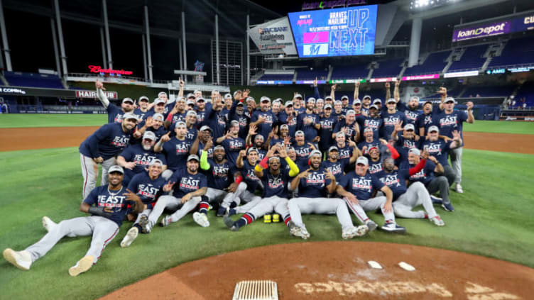 MIAMI, FLORIDA - OCTOBER 04: The Atlanta Braves pose for a group picture after clinching the division against the Miami Marlins at loanDepot park on October 04, 2022 in Miami, Florida. (Photo by Megan Briggs/Getty Images)