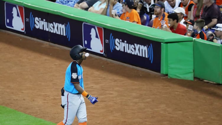 MIAMI, FL - JULY 09: Ronald Acuna #24 of the Atlanta Braves and the World Team walks back to the dugout after flying out in the second inning against the U.S. Team during the SiriusXM All-Star Futures Game at Marlins Park on July 9, 2017 in Miami, Florida. (Photo by Rob Carr/Getty Images)