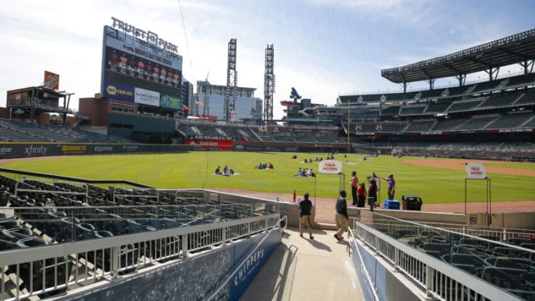 ATLANTA, GA - OCTOBER 08: Atlanta Braves fans enter the field to watch Game Three of the National League Division Series between the Miami Marlins and Atlanta Braves at Truist Park on October 8, 2020 in Atlanta, Georgia. (Photo by Todd Kirkland/Getty Images)