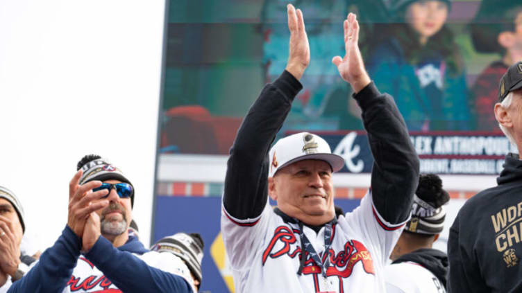 ATLANTA, GA - NOVEMBER 05: Manager Brian Snitker (R) cheers as members of the Atlanta Braves team speak following the World Series Parade at Truist Park on November 5, 2021 in Atlanta, Georgia. The Atlanta Braves won the World Series in six games against the Houston Astros winning their first championship since 1995. (Photo by Megan Varner/Getty Images)