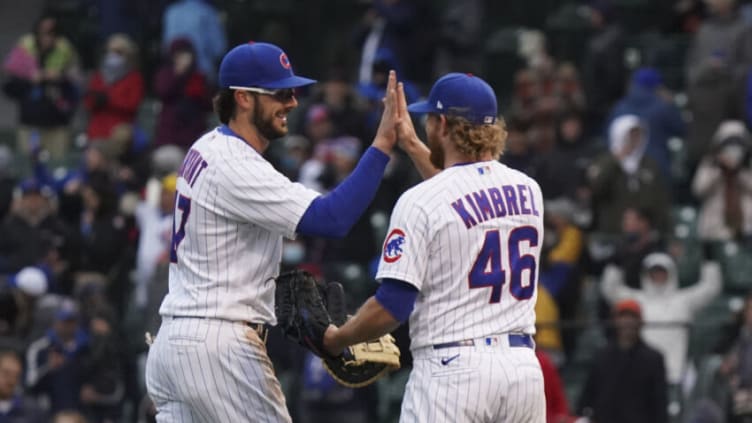 CHICAGO, ILLINOIS - MAY 28: Kris Bryant #17 of the Chicago Cubs celebrates with Craig Kimbrel #46 after their team's win over the Cincinnati Reds at Wrigley Field on May 28, 2021 in Chicago, Illinois. The Cubs defeated the Reds 1-0. (Photo by Nuccio DiNuzzo/Getty Images)