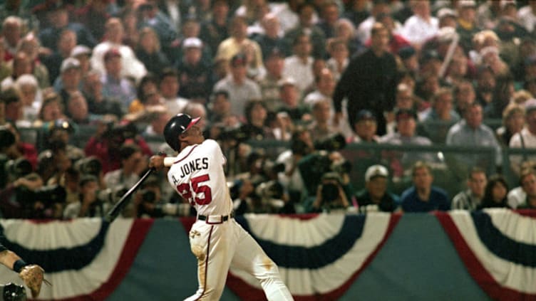 ATLANTA - OCTOBER 22: Andruw Jones #25 of the Atlanta Braves bats during Game three of the 1996 World Series against the New York Yankees at Atlanta-Fulton County Stadium on October 22, 1996 in Atlanta, Georgia. The Yankees defeated the Braves 5-2. (Photo by Stephen Dunn/Getty Images)