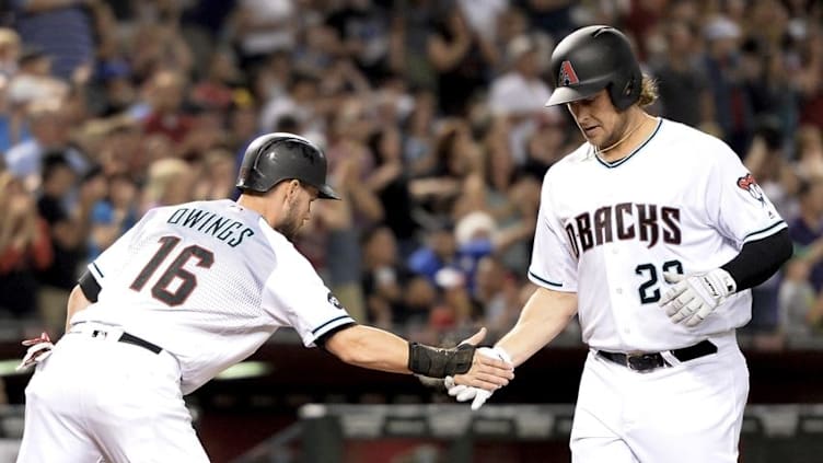 Sep 9, 2016; Phoenix, AZ, USA; Arizona Diamondbacks outfielder Kyle Jensen (29) celebrates with outfielder Chris Owings (16) after hitting a two run home run in the third inning against the San Francisco Giants at Chase Field. Mandatory Credit: Jennifer Stewart-USA TODAY Sports