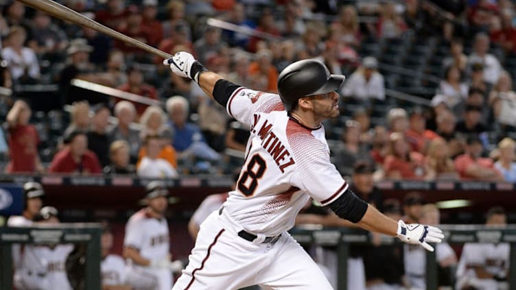 PHOENIX, AZ - SEPTEMBER 27: J.D. Martinez #28 of the Arizona Diamondbacks hits a solo home run in the ninth inning of the MLB game against the San Francisco Giants at Chase Field on September 27, 2017 in Phoenix, Arizona. (Photo by Jennifer Stewart/Getty Images)