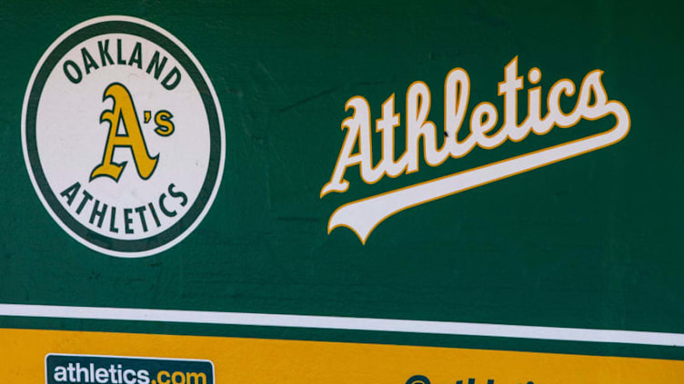 OAKLAND, CA - JULY 22: General view of the Oakland Athletics logos in the dugout before the game against the San Francisco Giants at the Oakland Coliseum on July 22, 2018 in Oakland, California. The Oakland Athletics defeated the San Francisco Giants 6-5 in 10 innings. (Photo by Jason O. Watson/Getty Images)