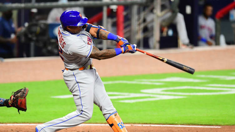 ATLANTA, GEORGIA - AUGUST 01: Yoenis Cespedes #52 of the New York Mets bats during the game against the Atlanta Braves at Truist Park on August 01, 2020 in Atlanta, Georgia. (Photo by Scott Cunningham/Getty Images)