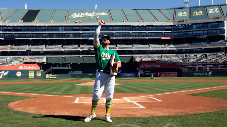 Oct 5, 2022; Oakland, California, USA; Oakland Athletics catcher Stephen Vogt acknowledges the cheers of the crowd as he is honored before a game against the Los Angeles Angels at RingCentral Coliseum. Vogt is retiring after 10 years in the majors after this game. Mandatory Credit: D. Ross Cameron-USA TODAY Sports