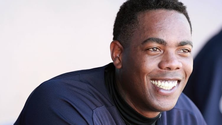 Mar 31, 2016; Tampa, FL, USA; New York Yankees relief pitcher Aroldis Chapman (54) smiles in the dugout against the St. Louis Cardinals at George M. Steinbrenner Field. Mandatory Credit: Kim Klement-USA TODAY Sports